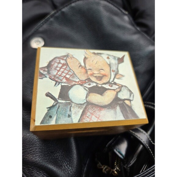 vintage Mapsa or Reuge musical trinket box featuring 